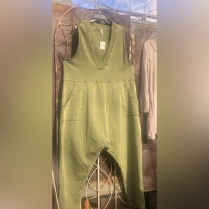 Sold 
FP Olive Green V neck romper with Pockets